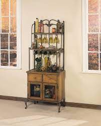 Easily access all of your favorite spices and stay organized with four shelves and five wine bottle holders. Powell Coventry Honey Maple And Cinnamon Storage Baker S Rack Pw A60 At Homelement Com
