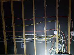 Some guys don't install the studs so that the holes line up so you are zig zagging the wire through them. Multiple Holes In Exterior Wall Studs For Electrical Wiring Home Improvement Stack Exchange