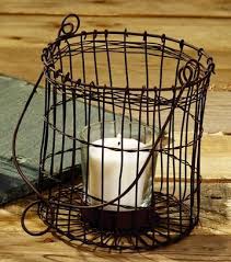 Oyaton christmas votive candle holders with snowy pinecone berry candle ring, decorative glass tealight candle holder set of 2 for home, wedding, living room and bedroom decor(exclude candles). Antique Primitive Vintage Rust Brown Iron Brown Wire Votive Candle Holder With Handle Primitive Vintage Tealight Tea Light Olivia S Heartland