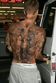 Justin Bieber Justin Bieber Tattoos Odell Beckham Jr Tattoos Tattoos The tattoo artist jonboy explained it represents the star's journey with finding purpose in god.
