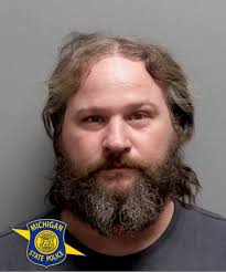 Wexford County man charged with killing/torturing neighbor's dog