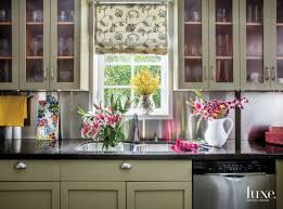 Painting cabinets and walls in the same shade can look very striking, as this duck green kitchen proves, or soft and easygoing, as illustrated by sulking room pink walls and paean black cabinetry make a bold, beautiful pair in this contemporary kitchen, where a simple wooden worktop and sleek. Eclectic Touches Reinvigorate A Vintage Home In Miami Beach