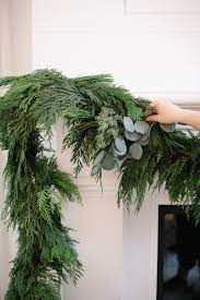 Check spelling or type a new query. Decking The Halls With West Coast Gardens Monika Hibbs Christmas Fireplace Garland Christmas Greenery Holiday Decor Christmas