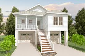 Since the house is more contemporary, i am using the slanted roof option for my roofing. Plan 765012twn Beach House Plan With Lower Level Garage Beach House Plan Small Beach Houses Stilt House Plans