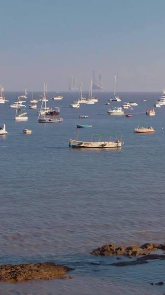 Mumbai, India. View On Many Ships And Boats Drift In Mumbai Harbour Or Bombay