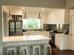 This large, classic, open plan queenslander has 3 bedrooms, 1 bathroom plus an attached self contained queen bed studio. Queenslander Homes Brisbane Kitchen Renovation Open Plan Queensland Minimal White Kitchen Kitchen Renovation White Kitchen Kitchen