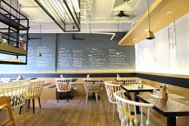Weekend Guide With Petite Passport The Coffeehouses Of Singapore With Images Restaurant Interior Industrial Chic Kith Cafe