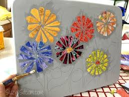 These are inexpensive, easy crafts to do at home using existing supplies. Recycled Magazine Art How To Create A Ceramic Mosaic Look With Paper
