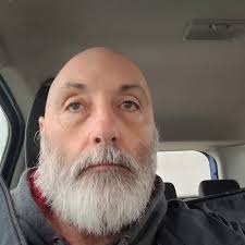 Well, it's not the dress I wanted to wear today, but everyone said I looked  great in this. I've ripped my panty hose and my hair is ridiculous, but  here is the