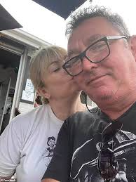 Ex-Jetstar pilot Greg Lynn's wife seen clearing up rubbish outside their  home and carrying a book with a heartbreaking message