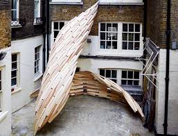 Plywood is typically sold in four foot by eight foot sheets. 3013 Installation Made From Recycled Wood Cascades Down London Building