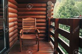 Great savings & free delivery / collection on many items. Wooden Chair On Porch Of Cabin Among Woods Cottage Balcony With Stock Photo Picture And Royalty Free Image Image 100106122
