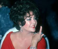 Elizabeth, glittering in her Cartier diamonds and rubies from Mike and the  Krupp diamond from Richard, lends her star power to the Night of 100 Stars,  a benefit for the Actors Fund