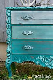 This technique adds subtle color while allowing the natural beauty of the wood to show through. Painted Teal Dresser With Ombre Drawers Tracey S Fancy