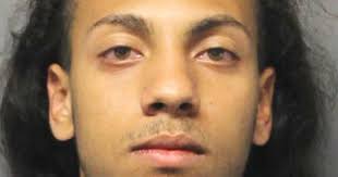 Video catches man firing gun near municipal lot