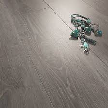 Bodrum Grey Stained Wood Effect Laminate Flooring 2 13 M Pack Departments Diy At B Q Laminate Flooring Grey Stained Wood B Q Laminate Flooring