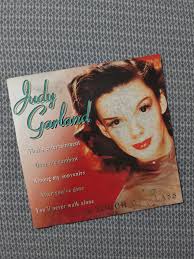 Judy Garland in Las Vegas with Tom Green, Bobby and Dolores Cole, and  others. November, 1967.