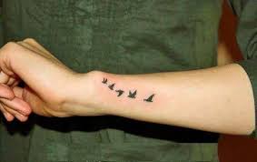 Bird Tattoos For Guys 77 Most Beautiful Small Tattoos That Everyone Wish To Have Bird Tattoo Wrist Small Bird Tattoos Bird Hand Tattoo