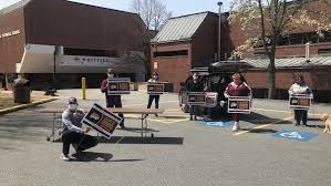 Whittier Tech, Booster Club deliver motivational signs to seniors