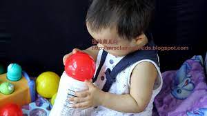 瑜玲育儿经 elaine teh 玩具 废物利用 罐子和小球的游戏 随手可得 children blog posts blog