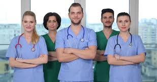 Medical Team Of Doctors Positive Presentation Looking Camera In Hospital Cabinet Stock Footage Positive Presentation Docto Doctor Medical Medical Presentation