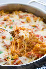 Easy One Pot Baked Ziti Recipe Made With Ricotta Ground Beef Or Italian Sausage And Mozzarella Cheese It S Creamy Baked Ziti Easy Baked Ziti Ziti Recipes