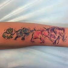 50 Original Elephant Tattoo Designs 7 Is Genius Elephant Family Tattoo Watercolor Elephant Tattoos Elephant Tattoo Design