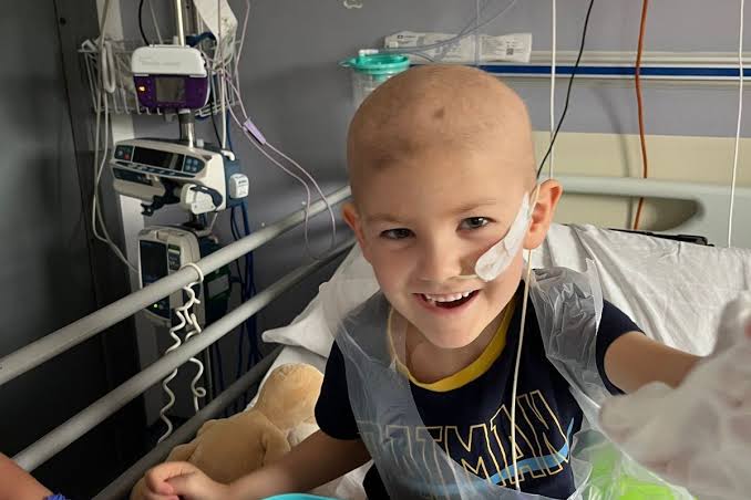 Boy, 5, 'temporarily paralyzed' after doctors dismissed symptoms as a 'school bug' - The Mirror US