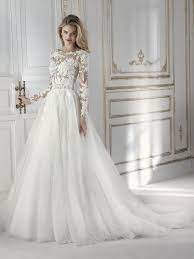 Exquisite Wedding Dress With A Two Piece Effect A Ballgown Design That Pairs A Full Tulle Skir Wedding Dresses Dream Wedding Dresses Wedding Dress Long Sleeve