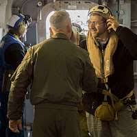 Aviation Support Equipment Technician 2nd Class Adam Haffner, from  Monroeville, Ind., directs the landing of an MV-22B Osprey from Marine  Medium Tiltrotor Squadron (VMM) 365.