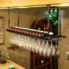 This hanging rack is an extremely versatile piece that can hang from any wall. Freestanding Wine Racks Cabinets Fkrack Simple Style Iron Hanging Wine Glass Rack Ceiling Decoration Shelf Bars Restaurants Kitchens Kitchen Dining