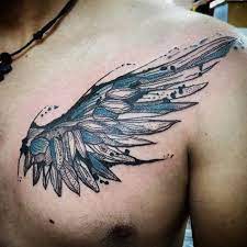 Unusual Designed Black And Blue Wing Tattoo On Chest Tattoos Photos Wing Tattoo Men Wings Tattoo Tattoos For Guys