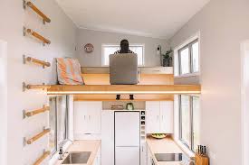 The concept of tiny houses has been around for a long time. Tiny House On Wheels With A Floating Office Study Loft
