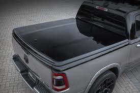 A One Piece Mopar Hard Tonneau Cover In Body Color Gloss Black I The Fast Lane Truck