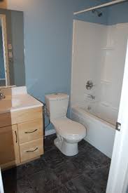Small 1/2 bath with vertical wall paneling. Finished Bathrooms Portfolio Bathroom Ideas