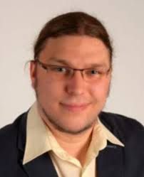 The progress in development of the Planck-Balance 2 (PB2): A tabletop  Kibble balance for the mass calibration of E2 class weights