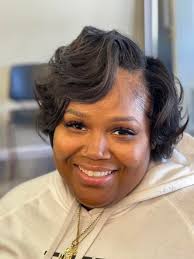 Who can do natural hair and weaves in Garfield, Shaker, Warrensville, or  Maple area?