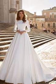 Sordamor Aline Satin Long Sleeves Wedding Dress With Cathedral Train Features Lace Corset With Boat Neck And Low V Back In 2021 Satin Wedding Gown Wedding Dresses Lace Long Wedding Dresses