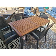From wooden dining table and chairs to teak garden benches, acacia patio sets, sun loungers and a sturdy pair of folding wooden garden chairs, this simple and stylish set are made from fsc certified acacia wood. Teak Banquet 118 Extendable 9 Piece Outdoor Dining Set With 8 Teak A Peter Andrews