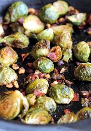 Maple Roasted Brussels Sprouts With Bacon Toasted Hazelnuts Ambitious Kitchen Recipe Bacon Brussel Sprouts Roasted Brussel Sprouts With Bacon