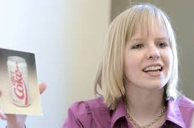 Brain surgery does not stop woman from earning degree