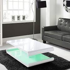 Led light coffee table should always look refreshing, unique and elegant, as that is where you would sit for a fresh cup of coffee and feel rejuvenated. Tiffany White High Gloss Coffee Table With Led Lighting T Https Www Amazon Co Uk Dp B01bgz4y7w R Coffee Table White Coffee Table With Drawers Coffee Table