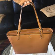I bought it because i thought it would be the most versatile with my wardrobe! Tory Burch Bags Tory Burch Tote Camel Brown Color Poshmark