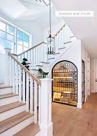 In The Details Under The Stairs Coco Kelley California Beach House Foyer Design House Design