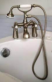 Find the perfect mobile home faucet here at mobile home parts store! Bathtub Deck Mount Faucet Telephone Style Satin Nickel W Hand Held Shower Wand Oemtelephonestylefaucet Faucet Bathtub Faucet Tub Faucet