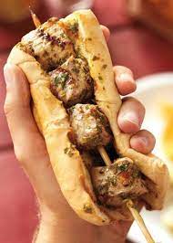 Homemade bread filled with italian marinated chicken served with homemade mayonnaise. Spiedie Sandwich Recipe And History Whats Cooking America