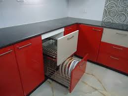 Here's a kitchen design facing into an open plan space. L Shaped Kitchen Designing In Nirman Tower Kolkata Id 10312941312
