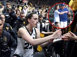 These days you'll normally watch Caitlin Clark doing the gift-giving. But  today, she also had to wait in line to get her idol's autograph. So, who is  her idol?