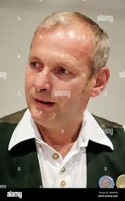 Christian Knauer, participant in the 44th German snuff tobacco  championship, waits for the judges' verdict after his effort in Kucha near  Offenhausen, Germany, 25 June 2011. Knauer from Diessen is the old