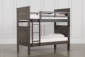 This bunk bed style works really well in their room and doesn't cramp the space like separate twin and full beds would have done. Owen Grey Twin Over Twin Bunk Bed Living Spaces